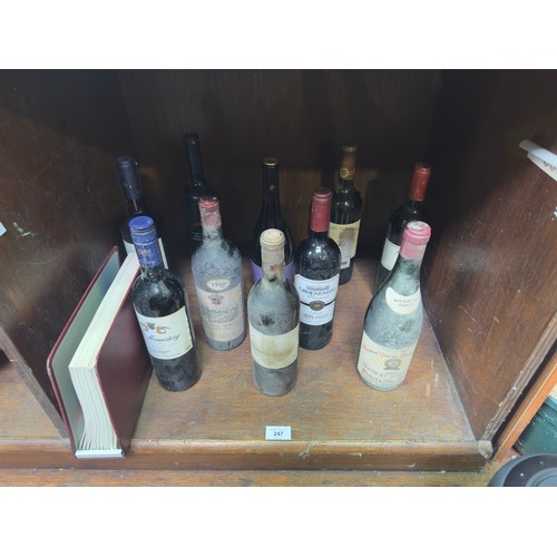 247 - Ten various bottles of wine, including a selection of vintage wines, comprising Chateau Coutet à Bar... 