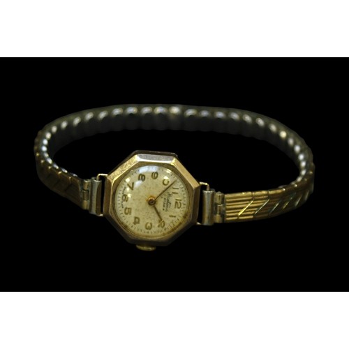 189 - A 9ct gold cased ladies Bentima Star manual wind wristwatch, the white enamel dial with gilt Arabic ... 