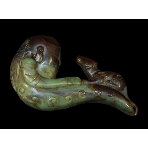 151 - A Chinese Nephrite Jade carved pendant figure of a sage with a rat, of serpentine profile, the man m... 