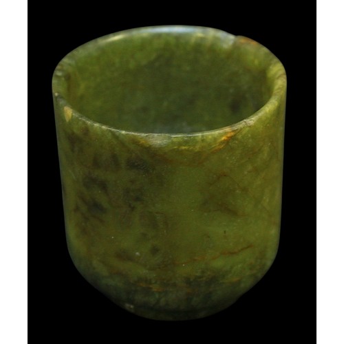 152 - A Chinese Qing Dynasty Nephrite Spinach Jade turned cup, raised on diminished circular foot, (rim ch... 