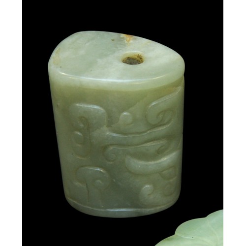 153 - A Chinese celadon nephrite Jade pendant, relief-carved each side with a bat on a cash coin, symbolic... 