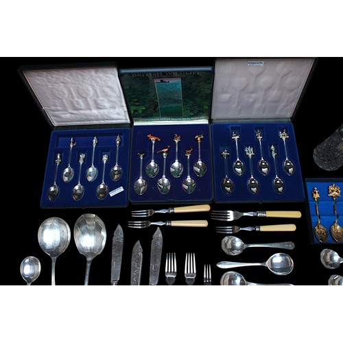 165 - A oak canteen of Elkington & Co silver-plated cutlery, for six persons, together with a silver toppe... 