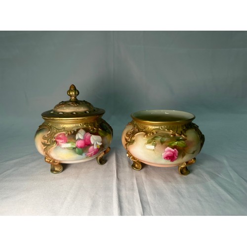 26 - A Royal Worcester pot pourri and a cover, dated 1911, of globular form, hand-painted with sprays of ... 