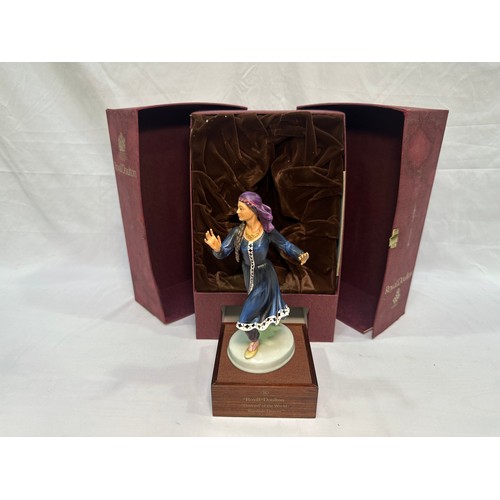 33 - A Royal Doulton figure ‘Dancers of the World Kurdish Dancer’, HN2867, limited edition no.627/750, in... 