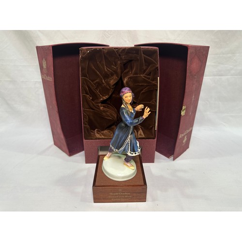 33 - A Royal Doulton figure ‘Dancers of the World Kurdish Dancer’, HN2867, limited edition no.627/750, in... 