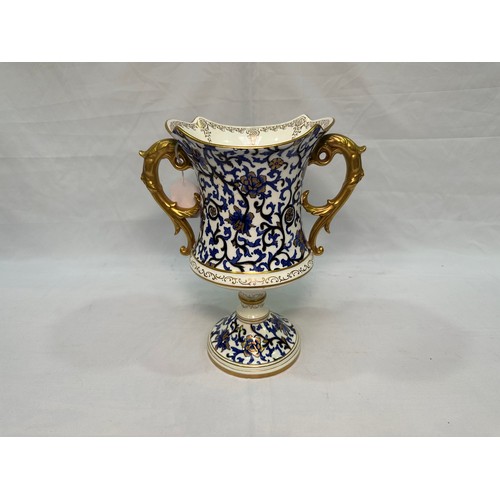 45 - A late 19th Century Coalport twin-handled pedestal trophy vase, c.1891-1900, hand-painted two-tone c... 