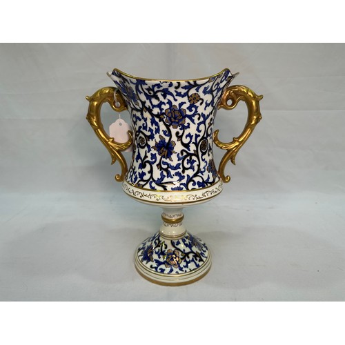 45 - A late 19th Century Coalport twin-handled pedestal trophy vase, c.1891-1900, hand-painted two-tone c... 