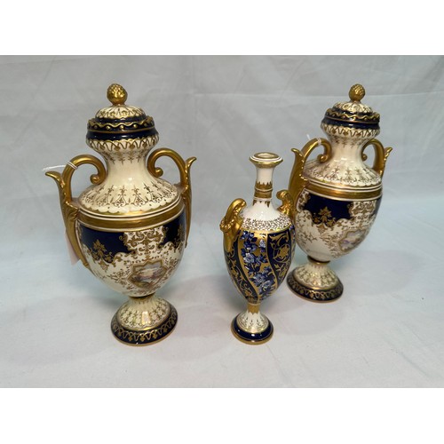 46 - A pair of late 19th / early 20th Century Coalport pedestal vases and covers (af), cobalt blue to cre... 