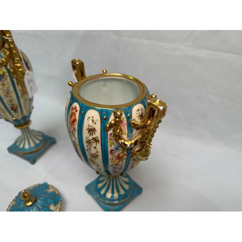 65 - Two similar Royal Rudolstadt porcelain twin-handled vases, one with cover, c.1900-1915, decorated wi... 