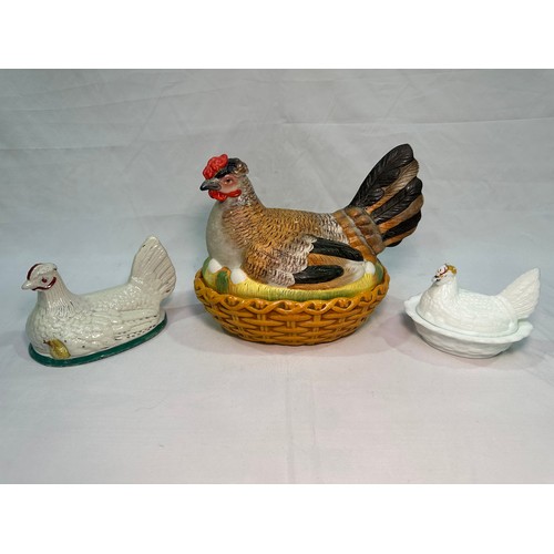 69 - A late 19th century Staffordshire Pottery egg basket modelled as a hand-painted hen on its glazed wi... 