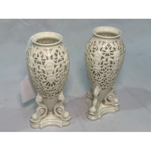 68 - A pair of Royal Worcester Grainger & Co Worcester reticulated vases, pierced in a scrolled pattern a... 