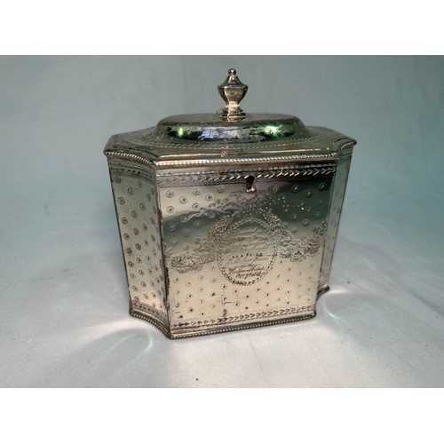 172 - A George III silver tea caddy by Henry Green, of square form with concave corners, a continuous etch... 