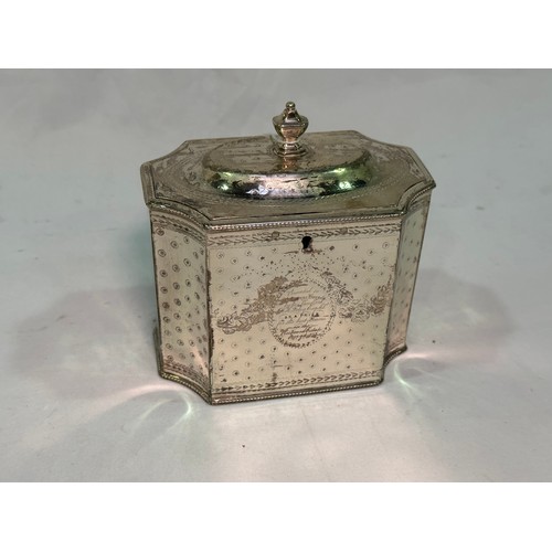 172 - A George III silver tea caddy by Henry Green, of square form with concave corners, a continuous etch... 