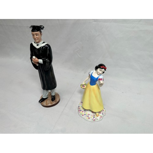 52 - Two Royal Doulton figures ‘Prestige Graduation’ HN5038 and ‘Disney Princess Snow White’ DP5, both in... 