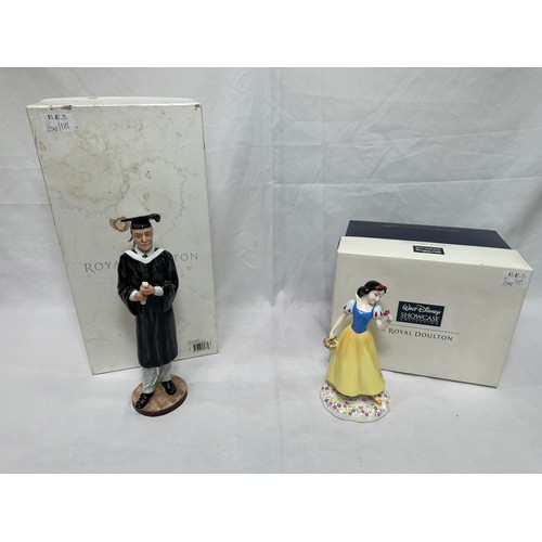 52 - Two Royal Doulton figures ‘Prestige Graduation’ HN5038 and ‘Disney Princess Snow White’ DP5, both in... 