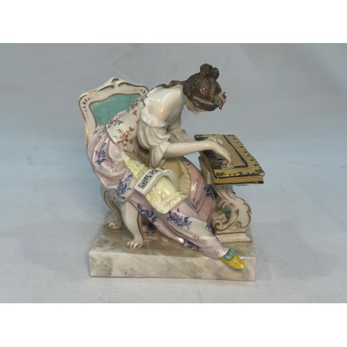 86 - A Ludwigsburg porcelain figure, ‘Lady seated at spinet’, designed after Johann Christian Wilhelm Bey... 