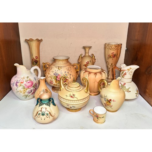 38 - A collection of assorted Royal Worcester blush ivory porcelain vases and jugs, all decorated with ha... 