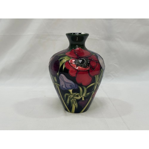 99 - A Moorcroft pottery vase of tapering cylindrical form with flared rim, in the ‘Anemone Tribute’ patt... 