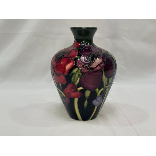 99 - A Moorcroft pottery vase of tapering cylindrical form with flared rim, in the ‘Anemone Tribute’ patt... 