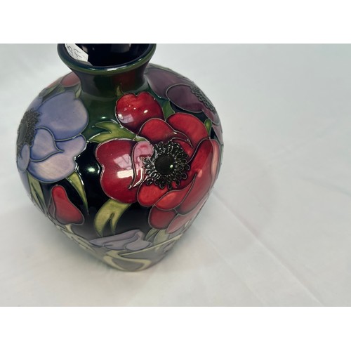 99 - A Moorcroft pottery vase of tapering cylindrical form with flared rim, in the ‘Anemone Tribute’ patt... 