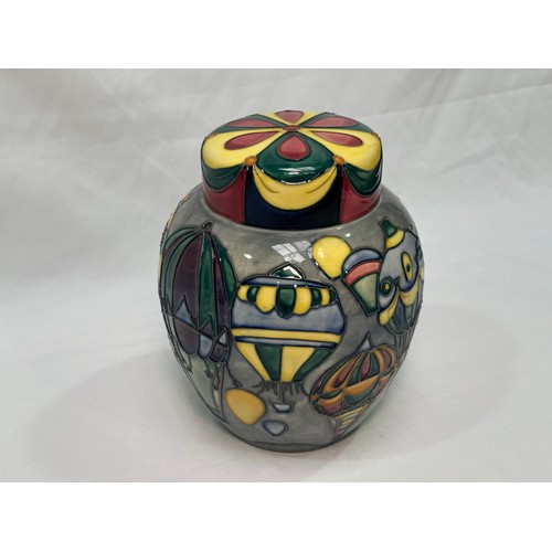 94 - A Moorcroft pottery ginger jar and cover in the ‘Balloons’ pattern by Jeanne McDougall, with factory... 