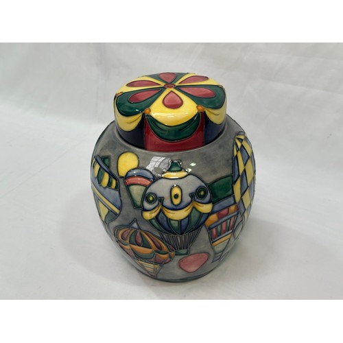 94 - A Moorcroft pottery ginger jar and cover in the ‘Balloons’ pattern by Jeanne McDougall, with factory... 