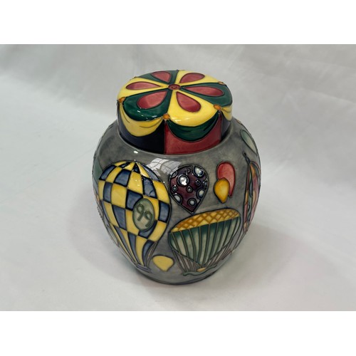 94 - A Moorcroft pottery ginger jar and cover in the ‘Balloons’ pattern by Jeanne McDougall, with factory... 