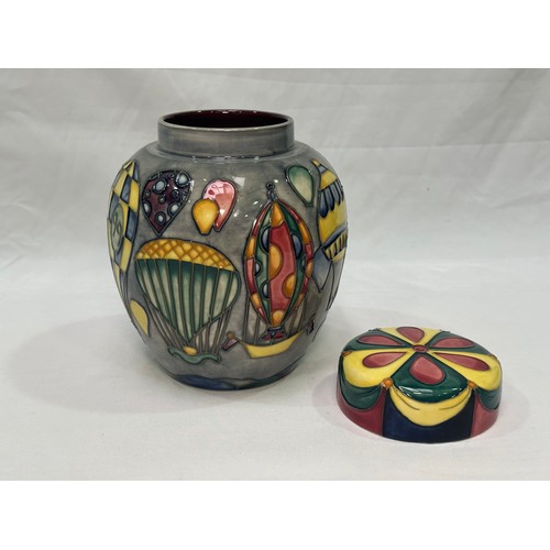 94 - A Moorcroft pottery ginger jar and cover in the ‘Balloons’ pattern by Jeanne McDougall, with factory... 