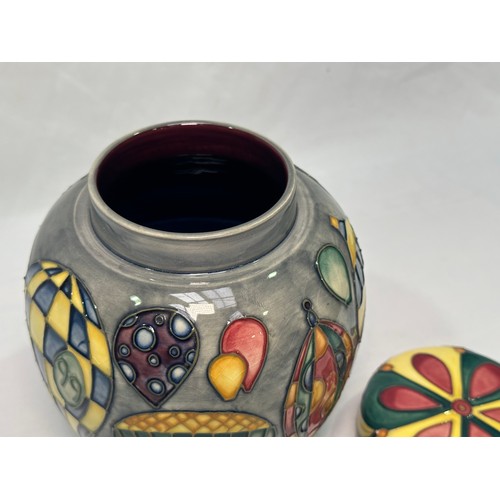 94 - A Moorcroft pottery ginger jar and cover in the ‘Balloons’ pattern by Jeanne McDougall, with factory... 