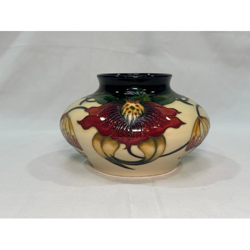 103 - A Moorcroft pottery vase, of compressed globular form, in the ‘Anna Lily’ pattern designed by Nicola... 