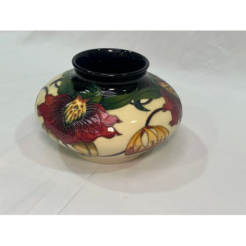 103 - A Moorcroft pottery vase, of compressed globular form, in the ‘Anna Lily’ pattern designed by Nicola... 