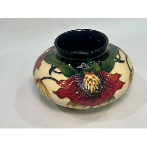 103 - A Moorcroft pottery vase, of compressed globular form, in the ‘Anna Lily’ pattern designed by Nicola... 