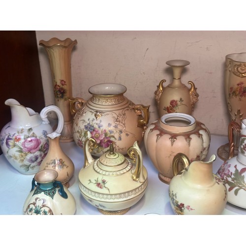 38 - A collection of assorted Royal Worcester blush ivory porcelain vases and jugs, all decorated with ha... 