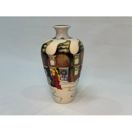 111 - A Moorcroft pottery vase of tapering cylindrical form with flared rim, in the ‘Christmas Morning’ pa... 