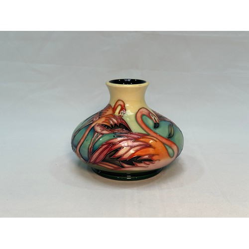 113 - A Moorcroft pottery vase, of compressed globular form with flared rim, in the ‘Everglade Flamingo’ p... 