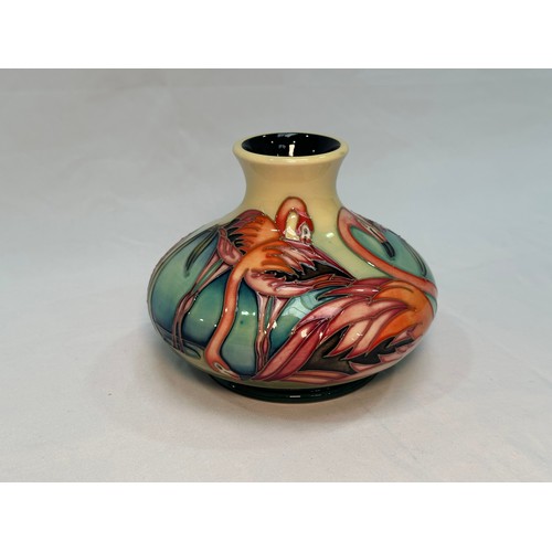 113 - A Moorcroft pottery vase, of compressed globular form with flared rim, in the ‘Everglade Flamingo’ p... 