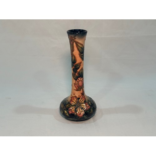 115 - A Moorcroft pottery vase of shaft and globe form, in the ‘Sweet Briar’ pattern designed by Rachel Bi... 