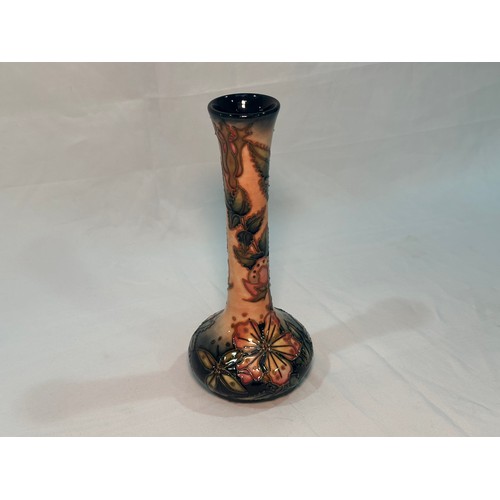 115 - A Moorcroft pottery vase of shaft and globe form, in the ‘Sweet Briar’ pattern designed by Rachel Bi... 