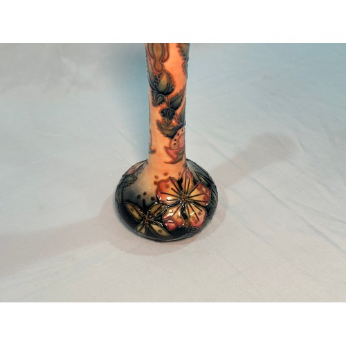 115 - A Moorcroft pottery vase of shaft and globe form, in the ‘Sweet Briar’ pattern designed by Rachel Bi... 