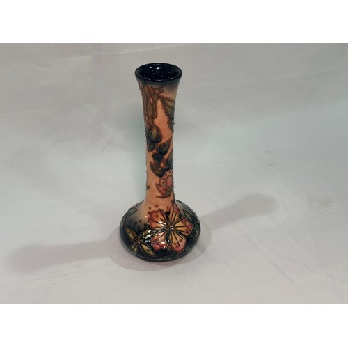 115 - A Moorcroft pottery vase of shaft and globe form, in the ‘Sweet Briar’ pattern designed by Rachel Bi... 