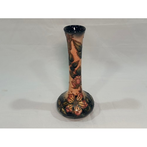 115 - A Moorcroft pottery vase of shaft and globe form, in the ‘Sweet Briar’ pattern designed by Rachel Bi... 