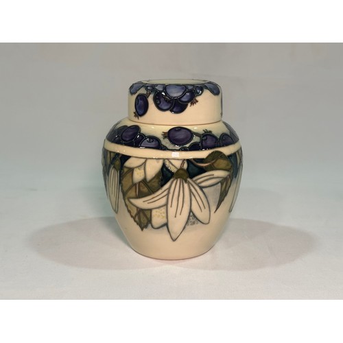 116 - A Moorcroft pottery ginger jar and cover, decorated in the ‘Juneberry’ pattern, designed by Nicola S... 