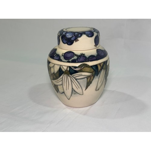 116 - A Moorcroft pottery ginger jar and cover, decorated in the ‘Juneberry’ pattern, designed by Nicola S... 