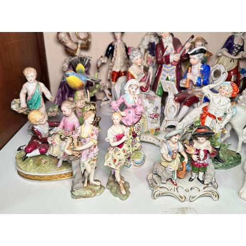 87 - A collection of English and continental porcelain and bone china figures, comprising Ludwigsburg, Sp... 