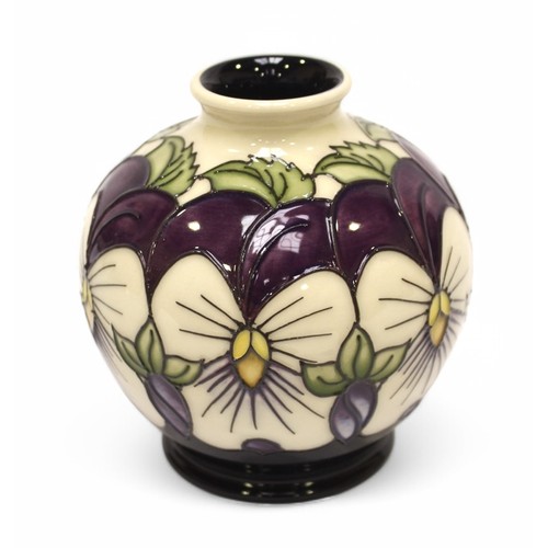 127 - A Moorcroft pottery vase of globular form, in the 'Viola Wing' pattern designed by Rachel Bishop, fr... 