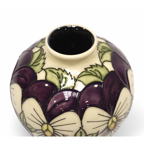 127 - A Moorcroft pottery vase of globular form, in the 'Viola Wing' pattern designed by Rachel Bishop, fr... 