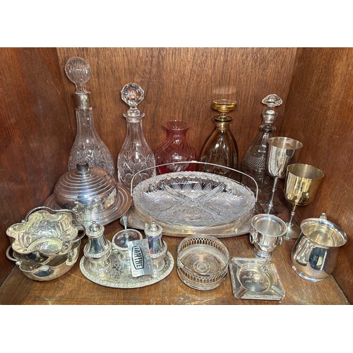 177 - A collection of cut-glass and silver-plated wares, including various decanters, bowls and vases, a c... 