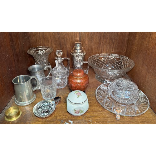 177 - A collection of cut-glass and silver-plated wares, including various decanters, bowls and vases, a c... 