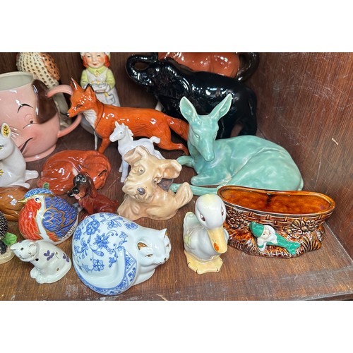 134 - A collection of various ceramic figures, mostly modelled as animals, to include Royal Crown Derby po... 