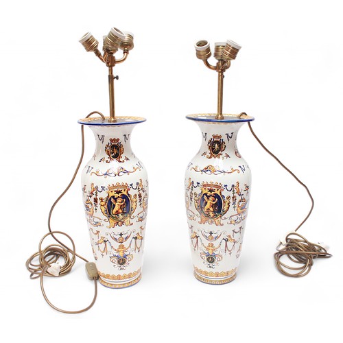 145 - A pair of late 19th century French 'Gien' faience pottery vases, of baluster form and decorated in t... 